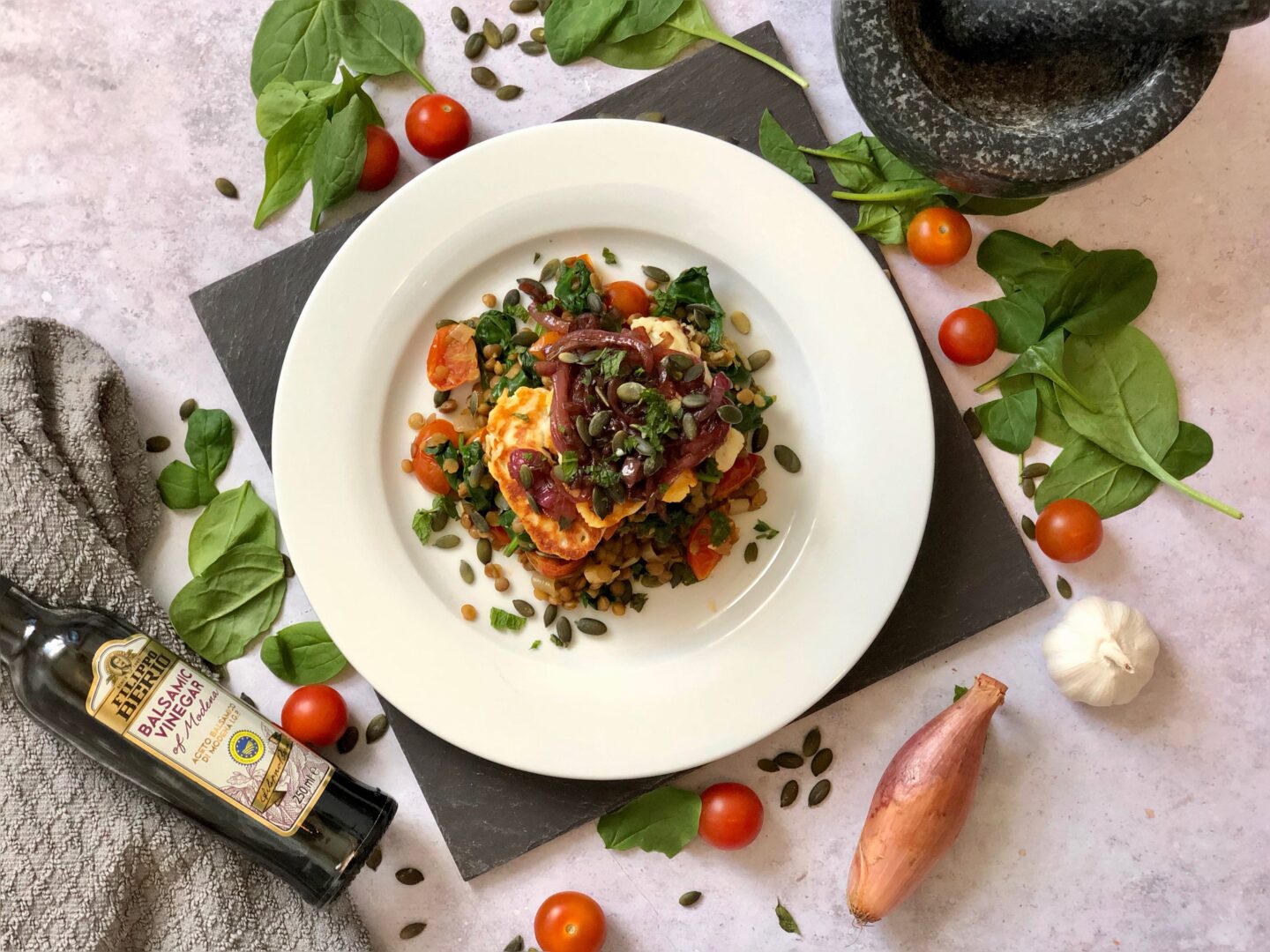 Pan fried halloumi with caramelised red onion and lentils recipe