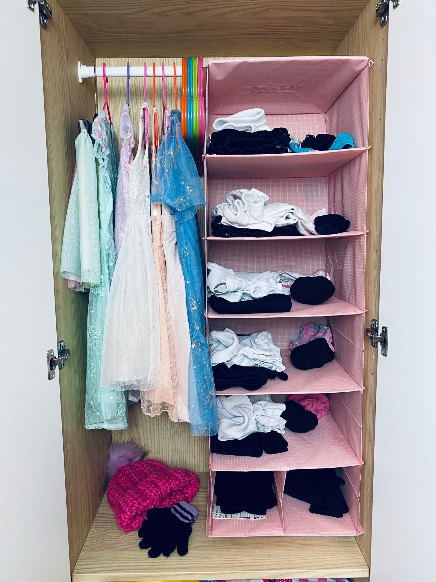 AD: Taking back control of mornings for only £51.75 with IKEA organisation hacks. Kid's wardrobe with hanging organiser hack.