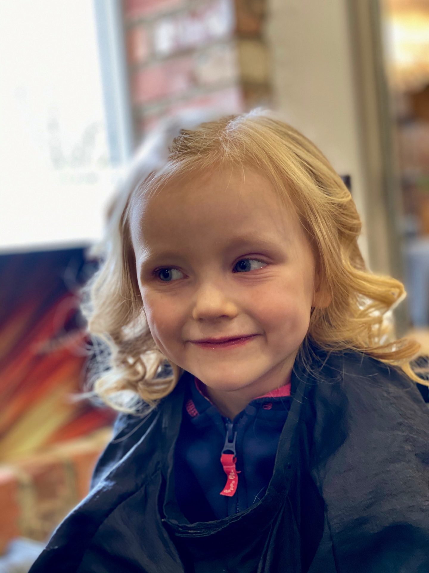 Letters to Lena - on your 5th birthday: 4 year old in hair salon smiling