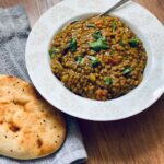 A slow cooker vegan mung bean and spinach dahl recipe that contains 3 of your 5 a day and 15g of protein that you can make for roughly £3.