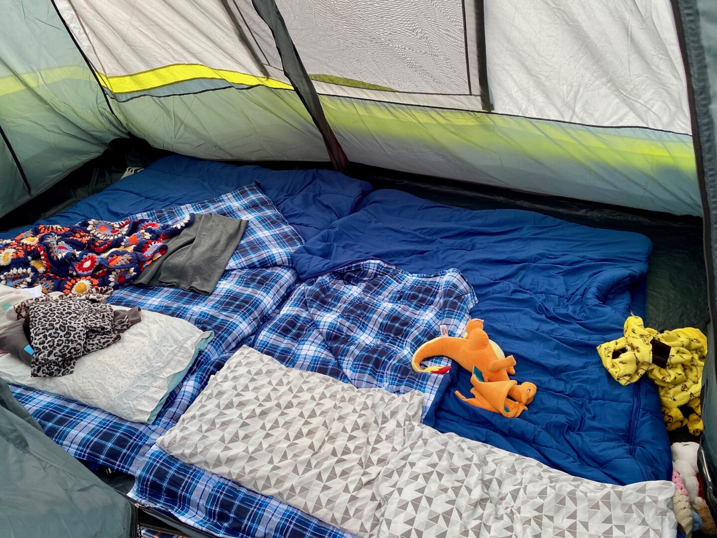 Bedroom set up of the tent with two double SIMS with two double sleeping bags and 4 pillows with room to spare.