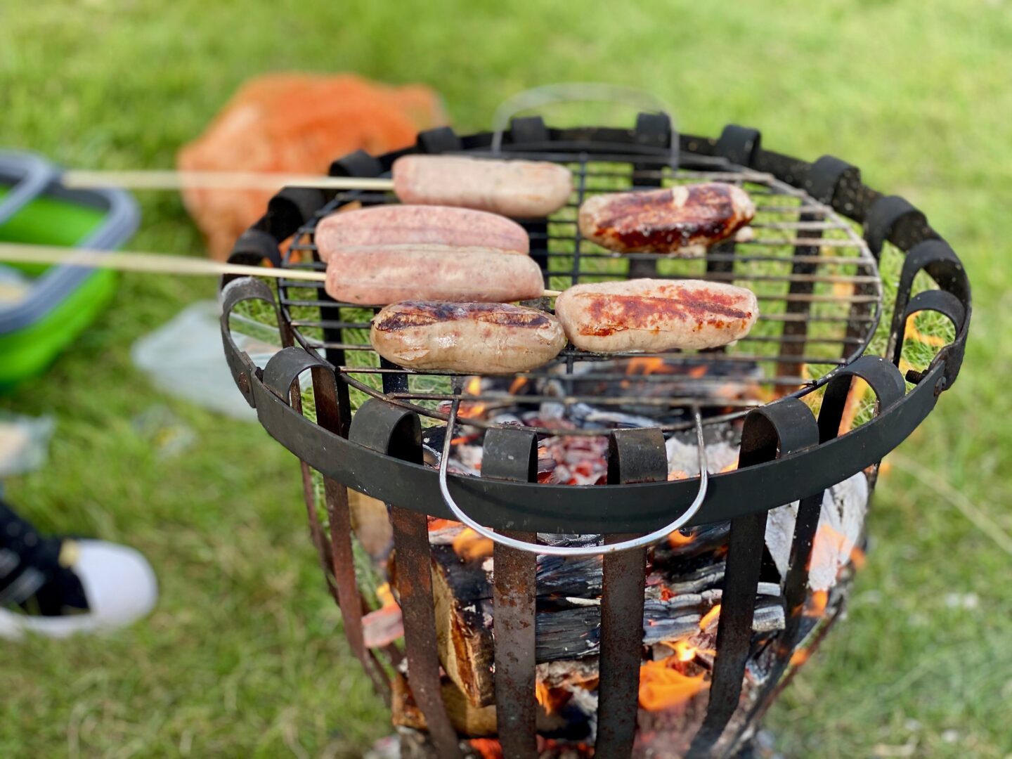 Sausages on a fire pit