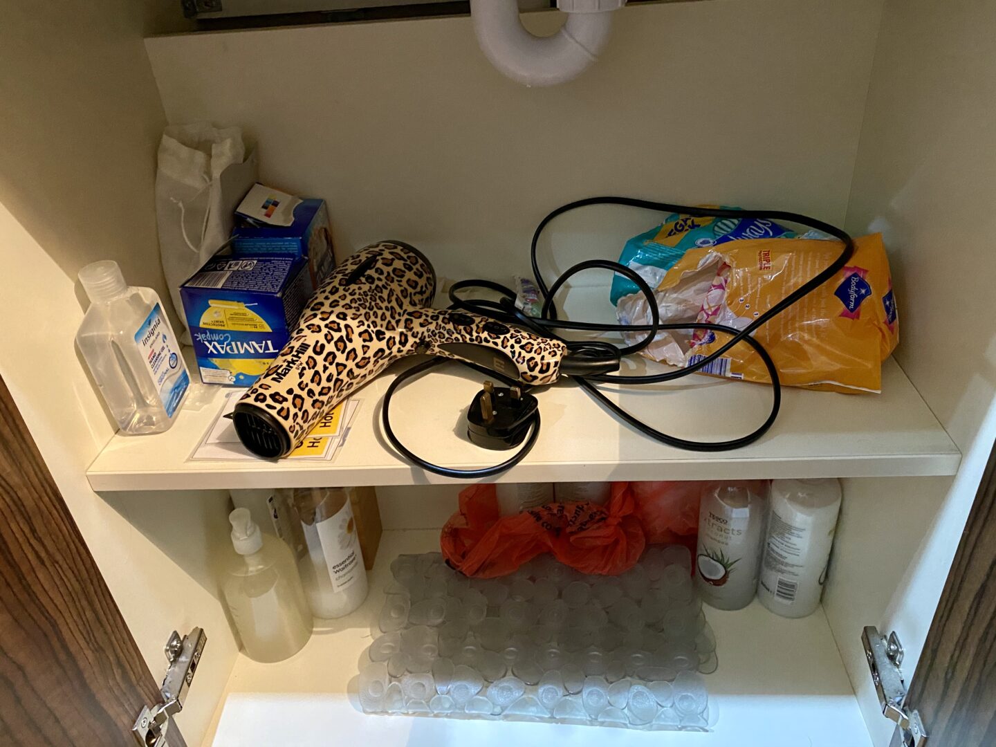 Hairdryer and sanitary products at the snug