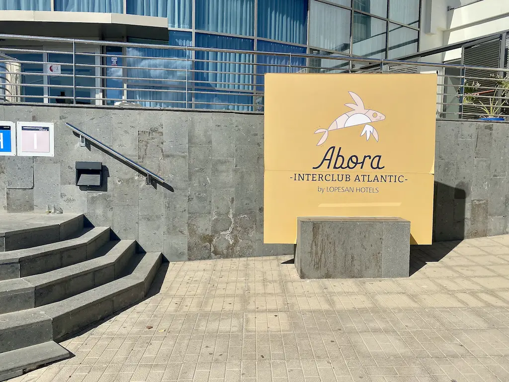 yellow sign saying Abora Interclub Atlantic