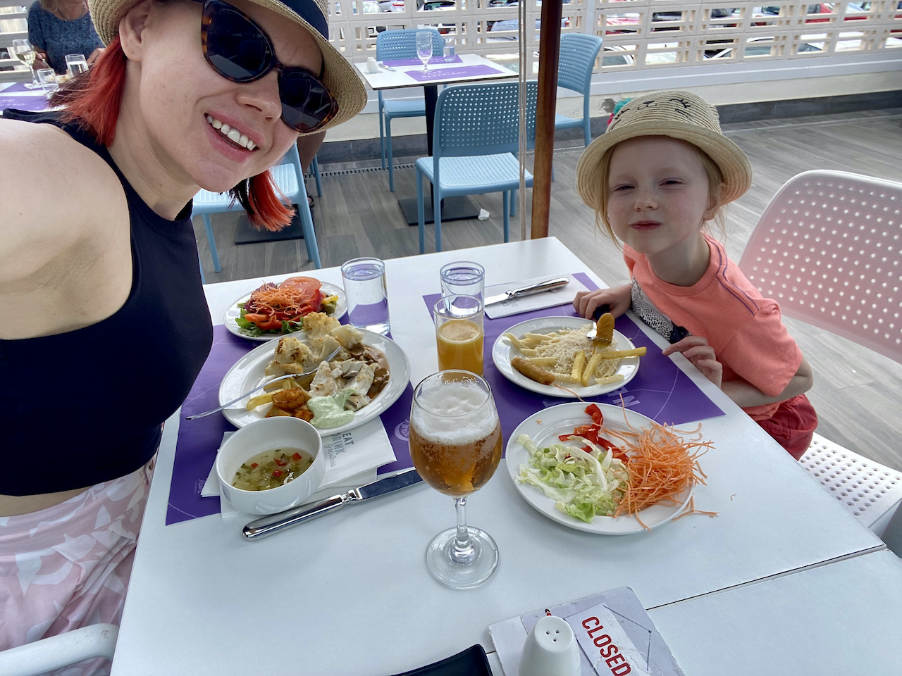 Mother and daughter eating lunch alfresco