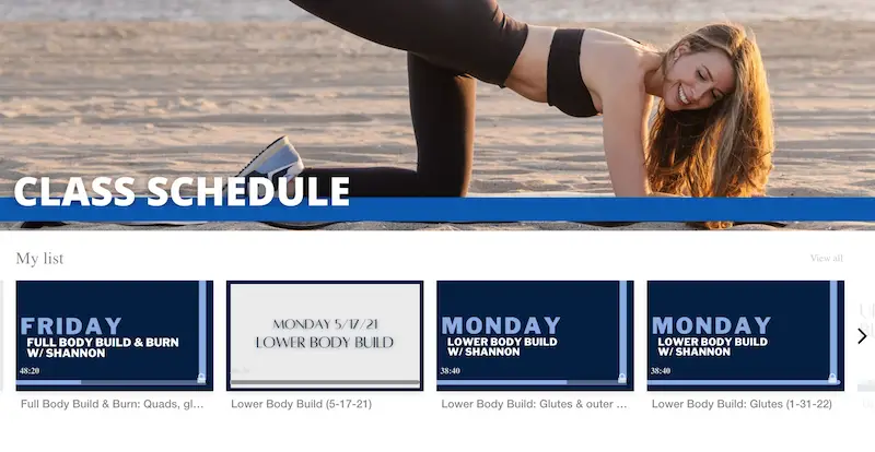 A screenshot of Evlo fitness desktop screen showing thumbnails of workouts and a photo of a woman doing a glute kickback on a beach