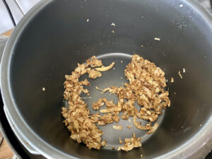 fried onions and spices for mung bean masala