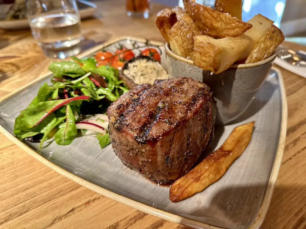 A large juicy steak at the Smithy restaurant at Runa Farm