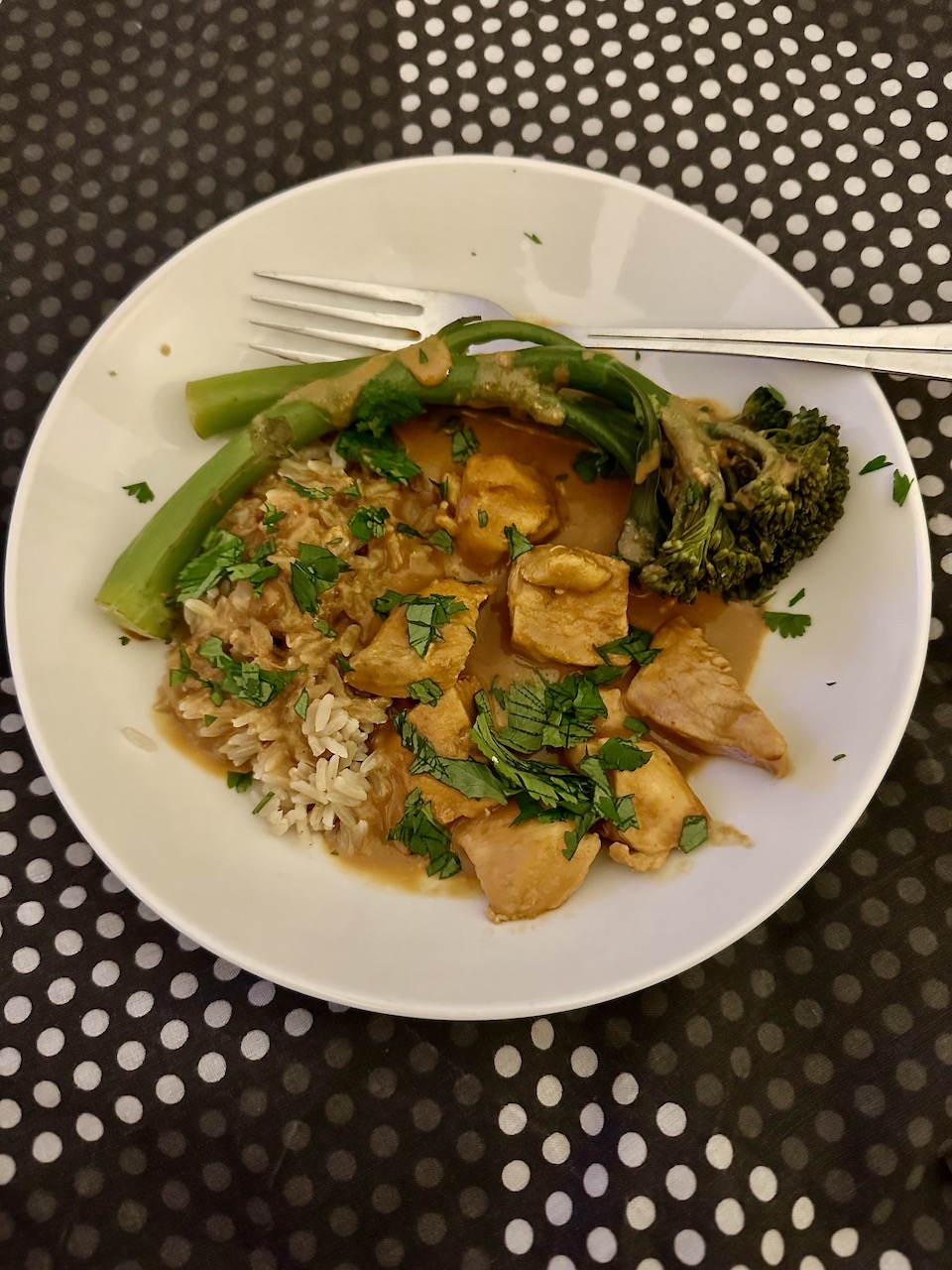 Chicken satay with rice and tender stem brocolli